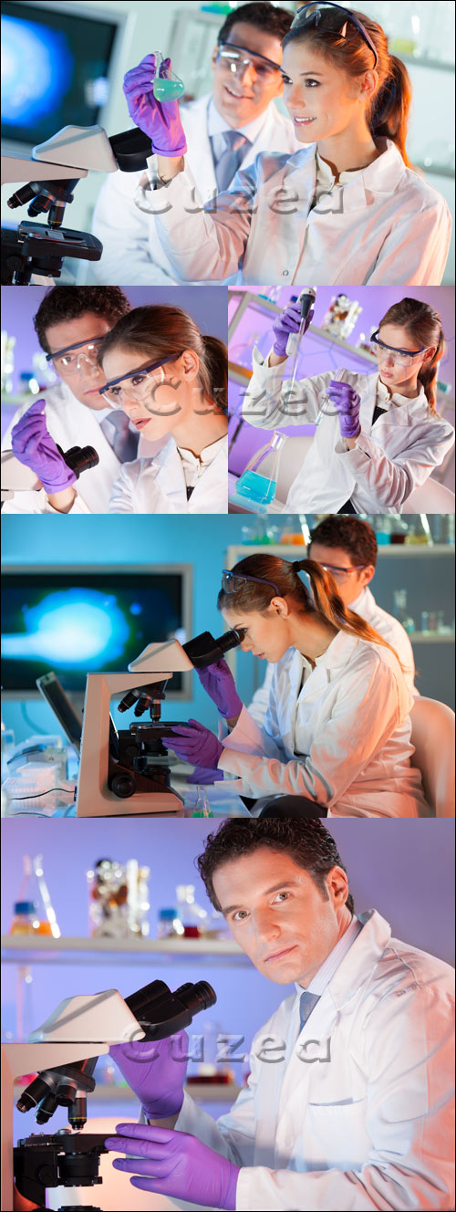 The man and the woman in laboratory with a microscope - Stock photo